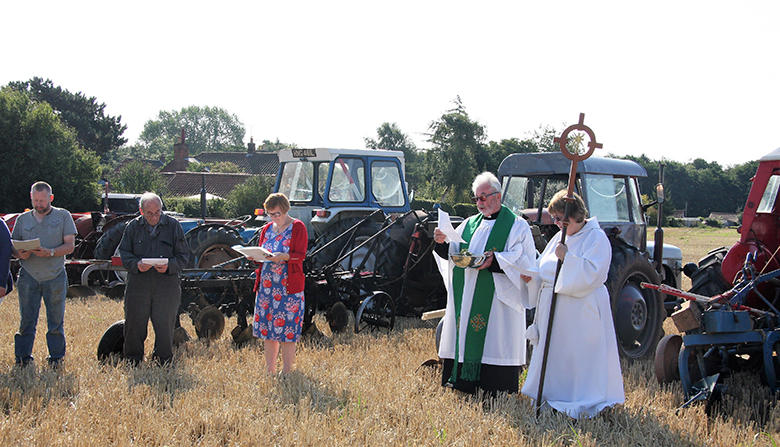 revd. barry furness conduting the service before the blessing of the ploughs. copyright maurice gray