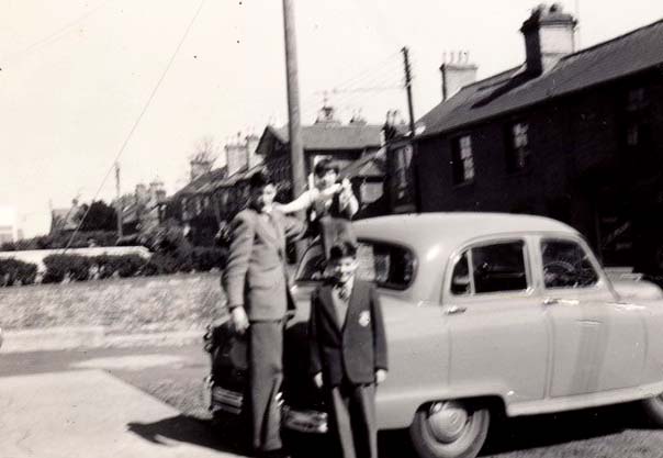 David with his siblings and their Standard Vanguard car
