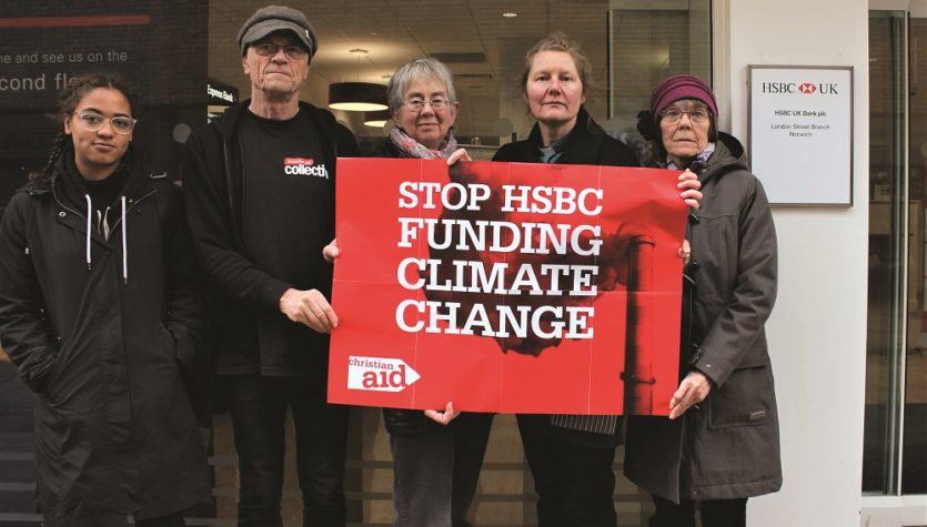 Standing outside a branch of HSBC in Norwich