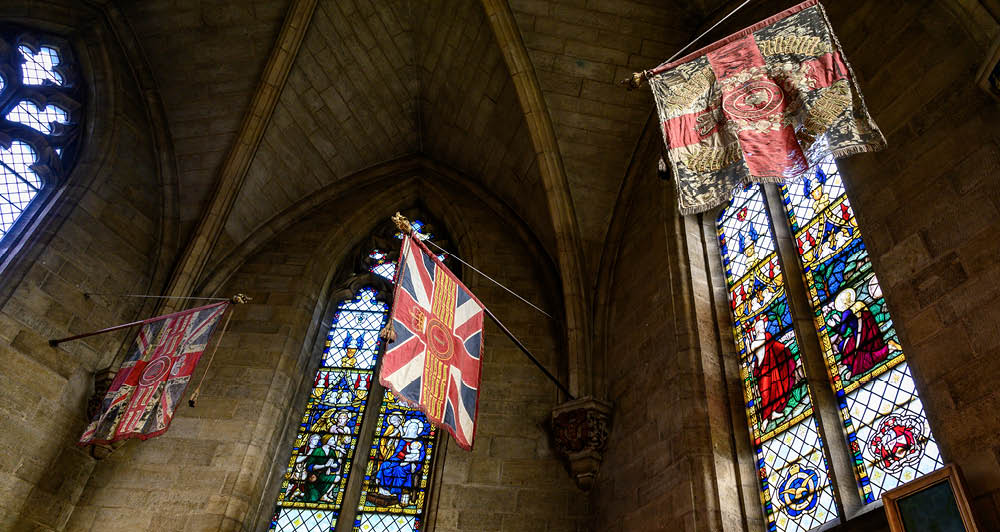 Military flags in St Saviour's Chapel at Norwich Cathedral (c) Bill Smith