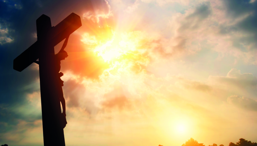 Silhouette Crucifixion of Jesus Christ and the sunset