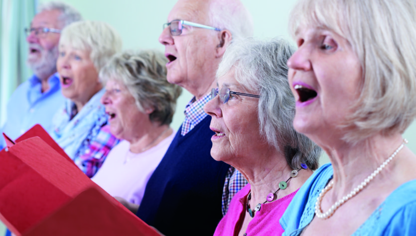 Group Of Seniors Singing In Choir Together