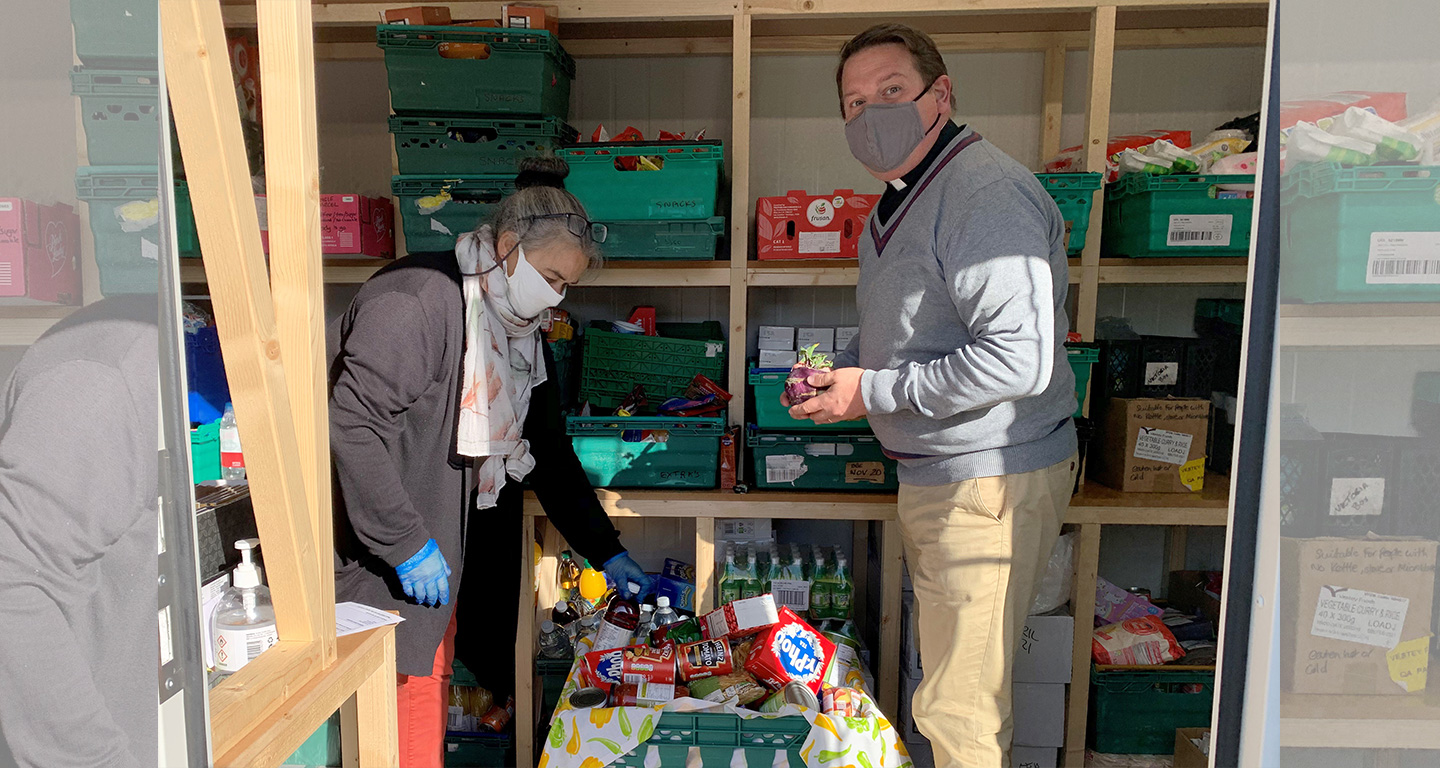 Matthew sorting food parcels during the COVID-19 response in August 2020
