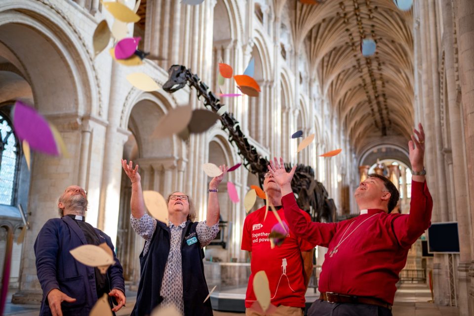 The Rt Revd Graham Usher, Bishop of Norwich, will deliver some of the 7000 pledges to protect the planet to COP26, inspired by Dippy the dinosaur's visit to Norwich Cathedral. Photograph: Norwich Cathedral/Bill Smith