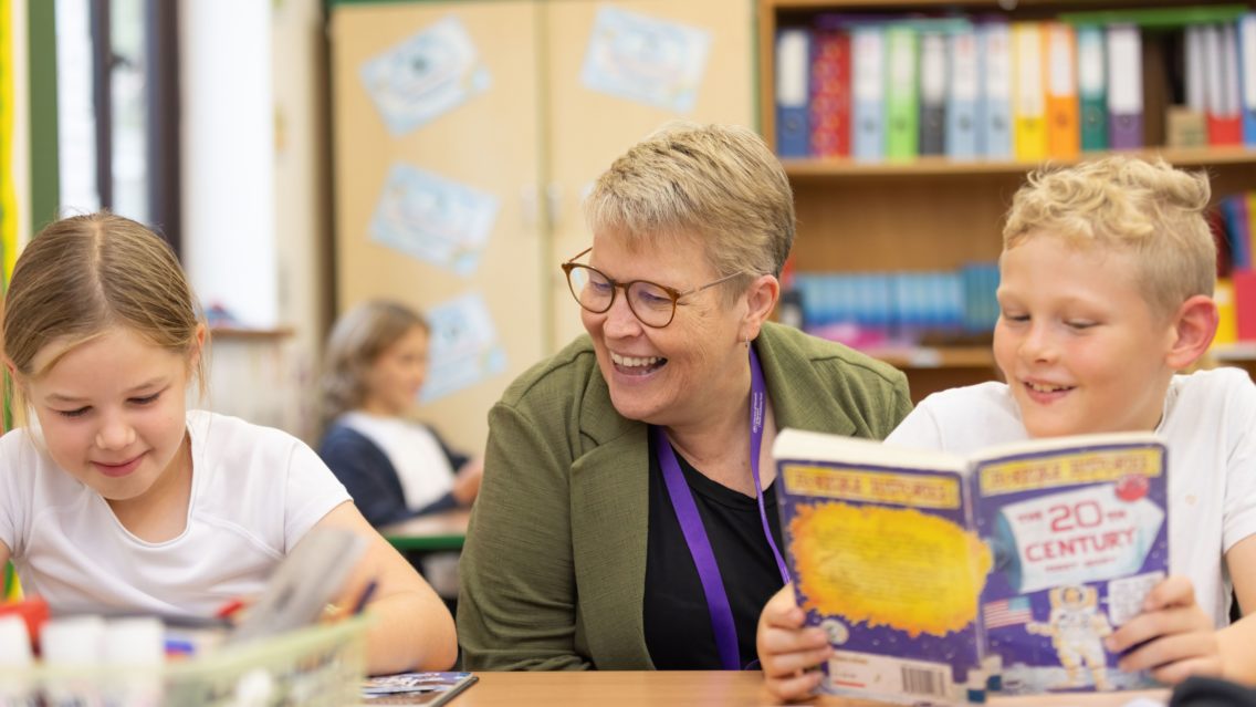 Moira Croskell, Executive Head with pupils jpeg