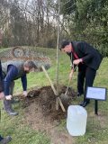 Planting a tree together in the memorial garden, for The Queen's Green Canopy
