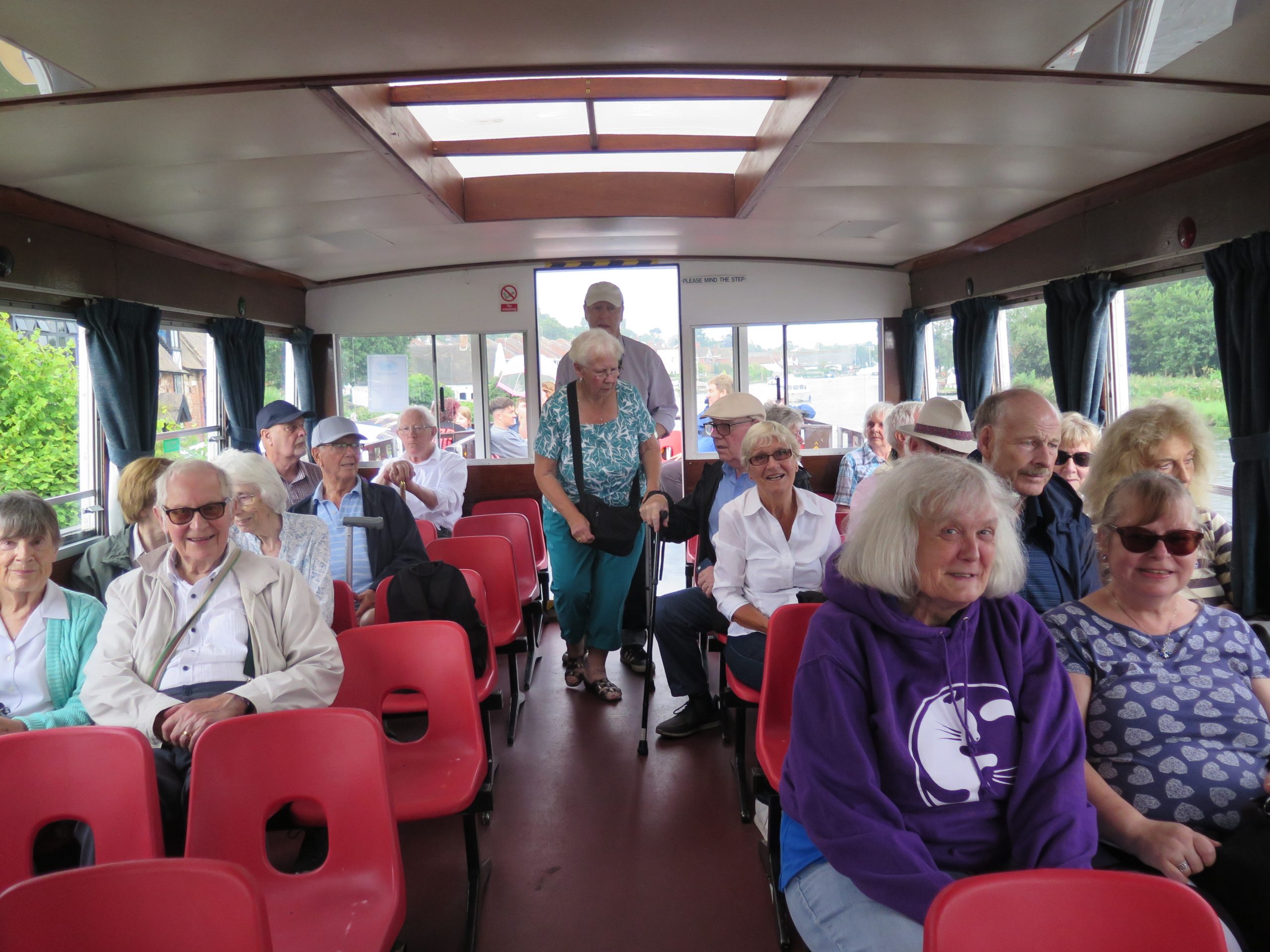 The Bus Pass Club enjoying a boat trip on the Norfolk Broads