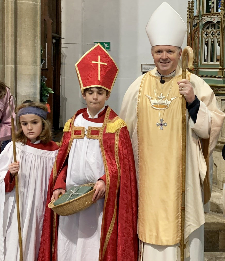 Bishop Graham with Bishop Owen, and younger brother Oscar, aged 8, a fellow chorister at North Walsham.