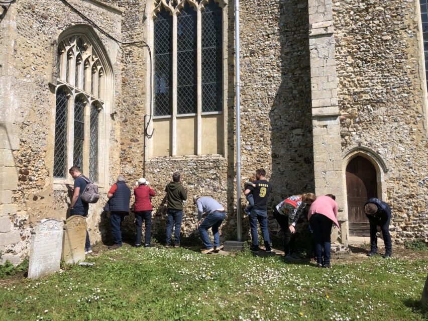 Group exploring St Bart's churchyard