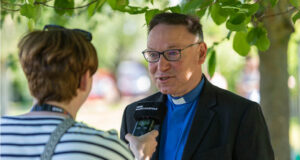The Ven Ian Bishop speaking with Radio Norfolk