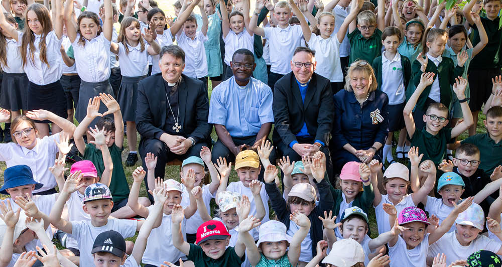 Bishop Graham, Revd Austin Uzoigwe, the Venerable Ian Bishop and Lady Dannett at Preston Church of England Primary School, Tasburgh School