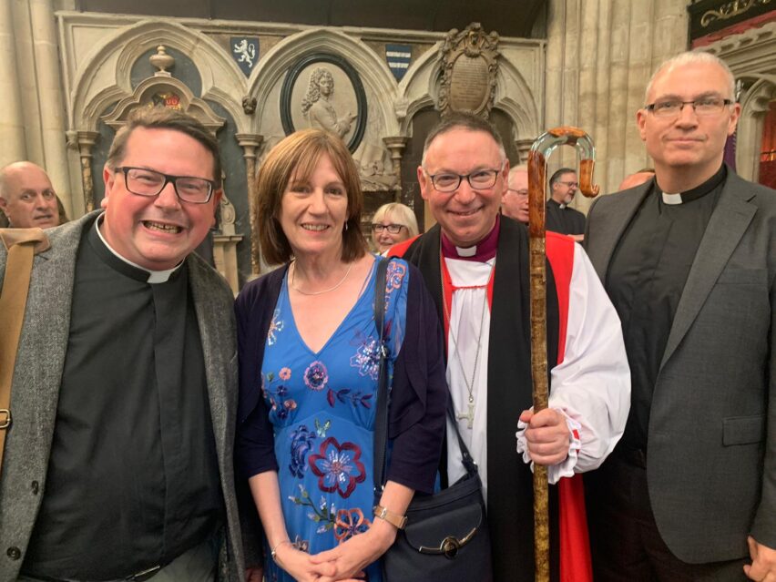 The Rt Revd Ian Bishop with his wife Sue, the Revd Matthew Price and the Revd Simon Ward at Westminster Abbey.