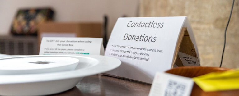 Contactless giving plate