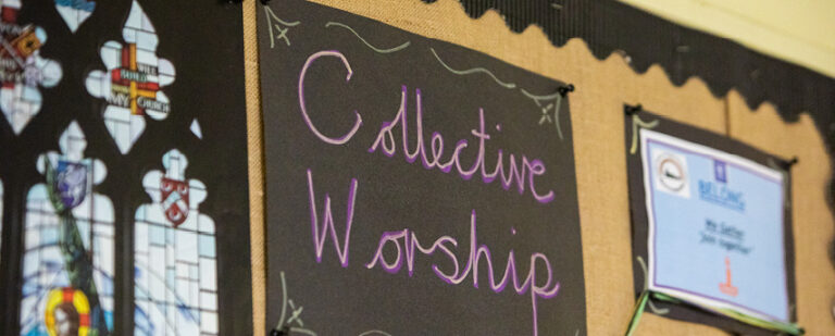 Collective worship poster on the wall of classroom