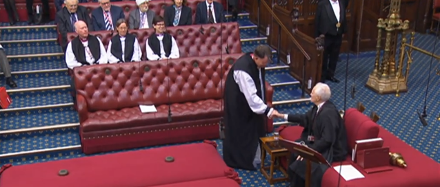 Bishop Graham being welcomed into the House of Lords as one of the Lords Spiritual.