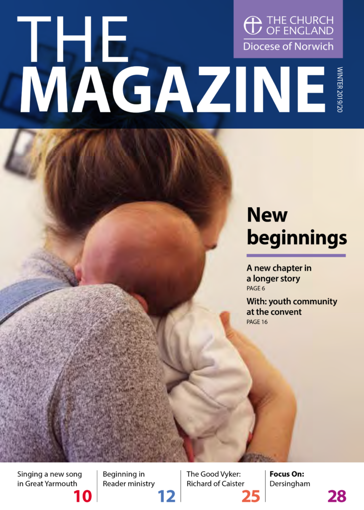 Winter magazine front cover of woman holding child