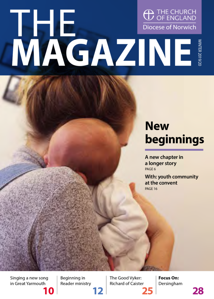 Winter magazine front cover of woman holding child